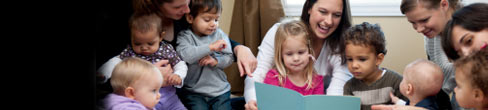 Young children with childcare workers
